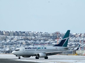 WestJet plane file. (Jim Wells/Postmedia Network Files)