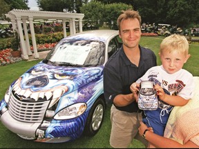 Little did Maple Leafs goalie Curtis Joseph know back in this 2000 photo op, but the youngster he was posing with — three-year-old Travis Dermott — would one day become a second-round draft pick of Toronto. Sorry, Cujo, but Travis decided to become a defenceman. (TORONTO SUN FILES)