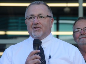 Eastalta Co-op General Manager Gerald Hiebert speaks to the crowd gathered at the official opening of the grocery store’s new building on Friday. No date has been set for a Grand Opening yet. - Chris Roberts, Standard Editor