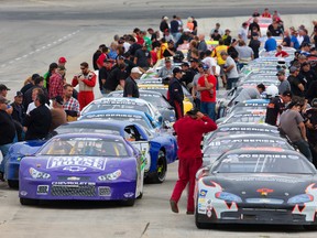 The success of the APC Late Model series is undeniable as the field of almost 40 cars line up before time-trial qualifying at Delaware Speedway Friday. (MIKE HENSEN, The London Free Press)