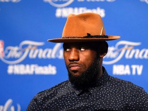 Cleveland Cavaliers forward LeBron James (23) talks to the media after game six of the NBA Finals against the Golden State Warriors at Quicken Loans Arena. Ken Blaze-USA TODAY Sports