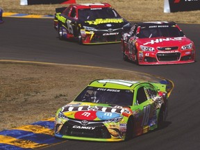 Kyle Busch, seen here making a rare right turn, won the NASCAR Sprint Cup Series Toyota/Save Mart 350 at Sonoma Raceway yesterday. His brother, Kurt, finished second.  (AFP)