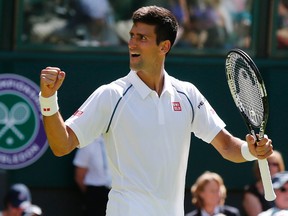 Novak Djokovic of Serbia celebrates after winning his match against Philipp Kohlschreiber of Germany at the Wimbledon Tennis Championships in London, June 29, 2015.   REUTERS/Suzanne Plunkett