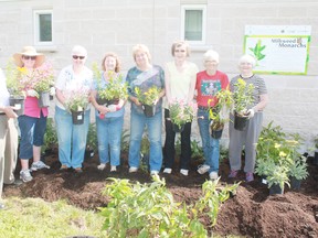 Members of the Horticultural Society were hard at work on Friday.