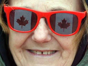 Stefka Hristovski wears Canadian glasses during Canada Day celebrations at The Forks las year. (Brian Donogh/Winnipeg Sun file photo)