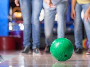 Bowlers roll gutter ball in choice to exclude. (Fotolia)