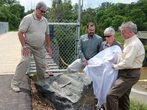 Ward Yorke (left), Jared Fedora, chair, and Tony Barrand, vice-chair of the Bluewater Trails Committee; and Sarnia mayor Mike Bradley unveiled the Ron Yorke Memorial Bridge at a ceremony Monday.PHOTO TAKEN at Sarnia Ontario on Monday, June 29, 2015. (CHRIS O’GORMAN/ SARNIA OBSERVER/ POSTMEDIA NETWORK)