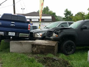 On Sunday, an alleged impaired driver with two children in her truck crashed her vehicle into Automotive Angels’ lot at 1:30 p.m., according to Kingston Police. (Supplied photo)