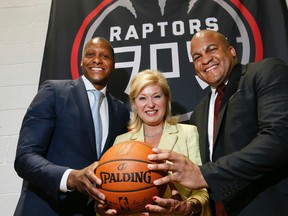 From left, Raptors GM Masai Ujiri, Mississauga mayor Bonnie Crombie and Malcolm Turner, president of the NBA Development League, were all smiles after announcing the Raptors 905 will start playing out of the Hershey Centre this fall. (Stan Behal/Toronto Sun)