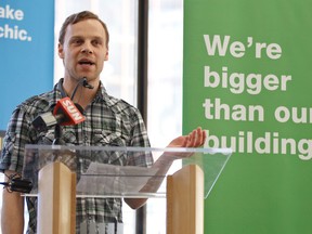 EPL Outreach worker Jared Tkachuk speaks during an Edmonton Public Library press conference announcing the expansion of the EPL's outreach worker program at the Stanley Milner Library in Edmonton, Alta., on Thursday, March 27, 2014. The library's team of three outreach workers will expand their services to five new library locations. Ian Kucerak/Edmonton Sun/Postmedia Network