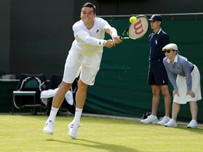 Milos Raonic plays a shot during his match against Daniel Gimeno-Traver at Wimbledon in Londonon Monday, June 29, 2015. (Henry Browne/Reuters)
