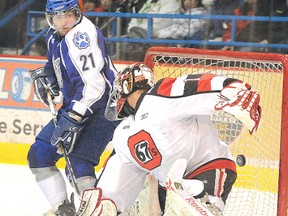 Sudbury Wolves Andrey Kuchin scores on Ottawa 67's goalie Petr Mrazek during OHL hockey action in Sudbury in 2011. Kuchin proved to be one of the Wolves' most impactful import draft picks. Gino Donato/The Sudbury Star/Postmedia Network