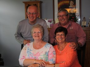 Dale (left) and his wife Raetta Fisher have enjoyed their visit to Cochrane. They also cherish the friendship of  Ralph and Liette Girard they have had for almost four decades.