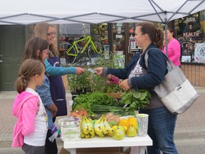 Before rain started to fall around 9 a.m., customers still had a chance to take advantage of the products offered by Farmers Market vendors.