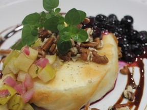 Baked Camembert with Blueberry Compote and Apple Chutney. Photo by Paul Shufelt