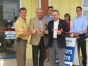 From left to right: Chamber of Commerce President Putts Strybosch, MP Bev Shipley, and Middlesex Warden Vance Blackmore during the opening ceremony of new Visit Middlesex office.