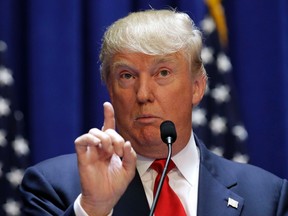 U.S. Republican presidential candidate, real estate mogul and TV personality Donald Trump makes a point as he formally announces his campaign for the 2016 Republican presidential nomination during an event at Trump Tower in New York in this June 16, 2015 file photo.   REUTERS/Brendan McDermid/Files