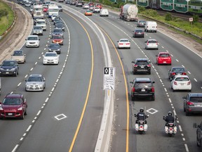 Morning rush-hour traffic on the Gardiner Expressway with the new temporary Pan AM Games HOV lanes Monday, June 29, 2015. (Ernest Doroszuk/Toronto Sun)