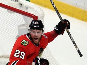CHICAGO, IL - MAY 27: Bryan Bickell #29 of the Chicago Blackhawks reacts to a second period goal by Marian Hossa #81 against the Anaheim Ducks in Game Six of the Western Conference Finals during the 2015 NHL Stanley Cup Playoffs at the United Center on May 27, 2015 in Chicago, Illinois.   Tasos Katopodis/Getty Images/AFP== FOR NEWSPAPERS, INTERNET, TELCOS & TELEVISION USE ONLY ==