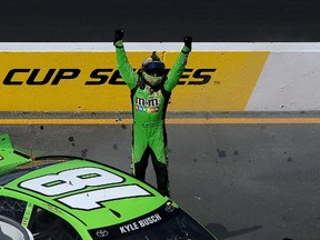 Kyle Busch celebrates after winning the NASCAR Sprint Cup Series Toyota/Save Mart 350 in Sonoma, Calif., on the weekend. (AFP)