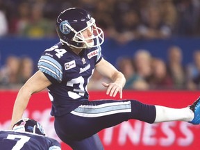 Toronto Argonauts’ Swayze Waters was injured on the opening kickoff of Saturday’s game against the Eskimos. (CP)