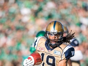 Winnipeg Blue Bombers wide receiver Justin Veltung (#19) runs the ball during the first half  of their CFL football game against the Saskatchewan Roughriders in Regina, Saskatchewan June 27, 2015. REUTERS/Matt Smith