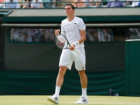 Canadian Milos Raonic celebrates after winning his match against Tommy Haas of Germany at the Wimbledon Tennis Championships in London, July 1, 2015.  REUTERS/Suzanne Plunkett