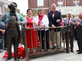 BRUCE BELL/THE INTELLIGENCER
This bronze bust created by Canadian-renowned sculptor Ruth Abernethy, entitled ‘Holding Court,’ depicts a 19-year-old John A. Macdonald on his first court case in Picton Courthouse in 1834 was unveiled at its permanent home in front of the Picton Armory during Canada Day celebrations on Wednesday afternoon. Pictured (left to right) are Ruth Abernethy, treasurer and CEO of the Law Society of Upper Canada, Janet Minor, M.P. Daryl Kramp, chairman of the Macdonald Project of Prince Edward County David Warrick and Mayor Robert Quaiff unveiling the statue.