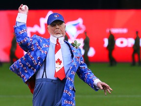 Hockey Night in Canada personality Don Cherry throws out the first pitch before action between the Toronto Blue Jays and the Boston Red Sox during MLB action at the Rogers Centre in Toronto, Ont. on Wednesday July 1, 2015. (Dave Abel/Toronto Sun)
