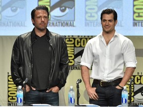 Actors Ben Affleck, left, and Henry Cavill attend the Warner Bros. Pictures panel and presentation during Comic-Con International 2014 at San Diego Convention Center on July 26, 2014. Only days after confirming a split with wife Jennifer Garner, Affleck confirmed he'll be back at Comic-Con this year alongside Cavill to promote Batman v Superman: Dawn of Justice. (Kevin Winter/Getty Images/AFP)