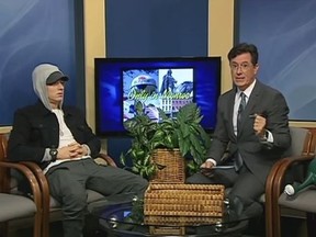 Rapper Eminem, left, joined Stephen Colbert on a public access cable show in Monroe, Michigan. (YouTube/Screengrabs)