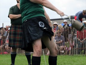 Heather Boundy prepares to let go a toss in the 28-pounds weight for height category during the Heavy Events competition in Embro, Ont. on Wednesday July 1, 2015 at the annual Highland Games. Berle Conrad won the men's Ontario championship while Celine Freeman-Gibb of Windsor won the women's. Greg Colgan/Woodstock Sentinel-Review/Postmedia Network