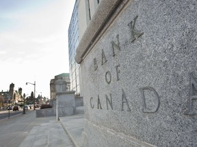 This April 12, 2011 file photo shows the Bank of Canada building in Ottawa, Ontario.   AFP/GEOFF ROBINS/STR