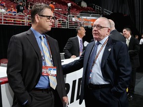 Buffalo Sabres general manager Tim Murray (left) talks with Pittsburgh Penguins GM Jim Rutherford during the 2014 NHL Draft at the Wells Fargo Center on June 28, 2014 in Philadelphia. (Bruce Bennett/Getty Images/AFP)