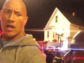 Actors Kevin Hart and Dwayne 'The Rock' Johnson have some fun while they wait for firefighters to investigate a possible fire on the set of the movie Central Intelligence. (Kevin Hart on Instagram/Screengrab)