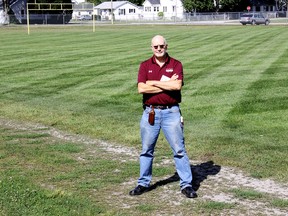 Wallaceburg District Secondary School principal Rob Lee is excited about the school receiving a $2.25 million capital funding grant from the Ministry of Education that was announced Wednesday. Some of the money will be used to replace the existing gravel track Lee is standing on that is overgrown with weeds. The funding will also be used to construct a new fitness centre and outdoor area for Grade 7-8 students and redesign the library. (ELLWOOD SHREVE, The Daily News)