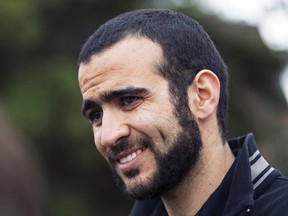Omar Khadr listens to a question during a news conference after being released on bail in Edmonton, May 7, 2015. (TODD KOROL/Reuters)