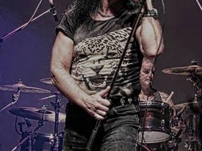 Dave Evans will perform with AC/DC tribute band Thunderstruck at Overtime Sports Bar on July 10. Evans, AC/DC's original lead singer, will also perform original material from two of his albums. (Supplied photo)