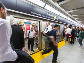 TTC subway riders exit a train on the new 2nd subway platform at Union Station. (Ernest Doroszuk/Toronto Sun)