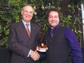 Corus Entertainment Inc. President and C.E. John Cassaday presenting Bill Welychka with a Samurai Award in Toronto.