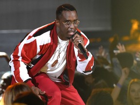 In this Sunday, June 28, 2015 file photo, Sean "Diddy" Combs performs at the BET Awards at the Microsoft Theater in Los Angeles. The Los Angeles County district attorney’s office has declined to file felony charges against Combs for a confrontation last month at the University of California, Los Angeles, where his son plays football. District Attorney spokesman Ricardo Santiago said Thursday, July 2, 2015, his office has decided instead to turn the case over to the Los Angeles city attorney’s office.
