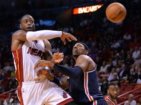 Heat guard Dwyane Wade signed a one-year deal for $20 million to stay in Miami. Wade has won three titles with the Heat.