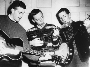 Bernie Sheridan, left, Dave Koyle and John Cassidy tune up in the early 1960s as St. Thomas's Nottingham Three. The trio, which opened the storied Rolling Stones concert in 1964 in London at the Treasure Island Gardens, reunites July 25 for a concert at the Princess Avenue Playhouse.