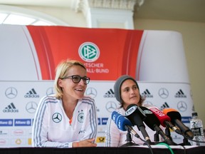 Germany's Saskia Bartusiak speaks during a press conference with teammate Nadine Angerer at the FIFA Women's World Cup on Thusday. Germany is set to meet England in the bronze medal match on July 4. (AFP)