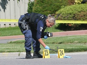 Durham Regional Police at the scene of a fatal stabbing on Glenanna Rd. at Huntsmill Dr. in Pickering on Thursday July 2, 2015. (Veronica Henri/Toronto Sun)