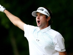 Bubba Watson reacts to his shot from the 15th tee during the third round of the Travelers Championship at TPC River Highlands on June 27, 2015 in Cromwell, Conn. (Jim Rogash/Getty Images/AFP)