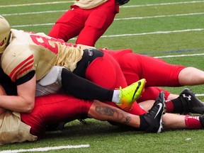 Jeremy Jones, No. 88 on top of the pile, is in his second season with the Sarnia Imperials after playing his rookie year while still in high school. Imperials head coach Jake Cherski pointed out the positive impact young players such as Jones can have on the team while looking ahead to their next Northern Football Conference game Saturday in Toronto at 7 p.m.