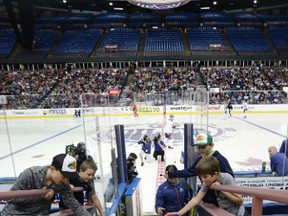 Kids high five Connor McDavid after going through drills on the 3rd day of camp at Rexall Place in Edmonton, Alberta on Friday, July 3 2015.  Perry Mah/Edmonton Sun