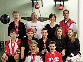 CONTRIBUTED PHOTOS
Qualifying for the 2015 WKC Worlds in Orlando were kickboxers (front) Luca Meyer, Ewan Lindsay, (middle) Aaron Mostbacher, Ryan Hill, Jagger Rockefeller, Suzanne Hill, Ronda Meyer, (back row) Clayton Meyer, Mike Hill, Bobbi Ann Dwornikiewicz, and Greg Rockefeller, all from The Pitt in LaSalette.