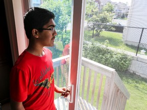 12 year old Nabeel Mirza of Kanata can't enjoy  his normal outdoor activities like cycling and basketball because of the large number of mosquitoes in the area. Friday July 3, 2015. Errol McGihon/Ottawa Sun/Postmedia Network